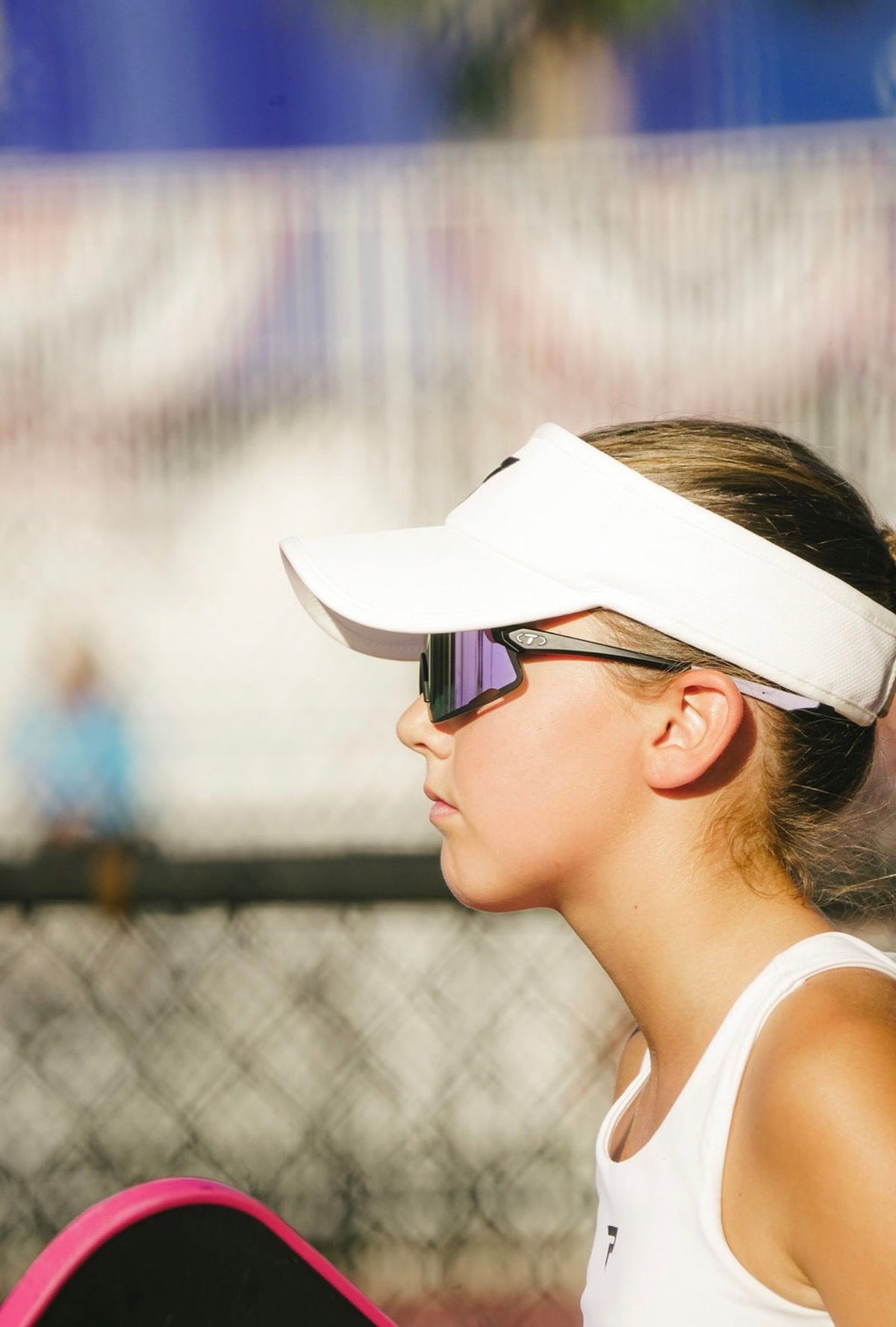 Young woman wearing tifosi sunglasses