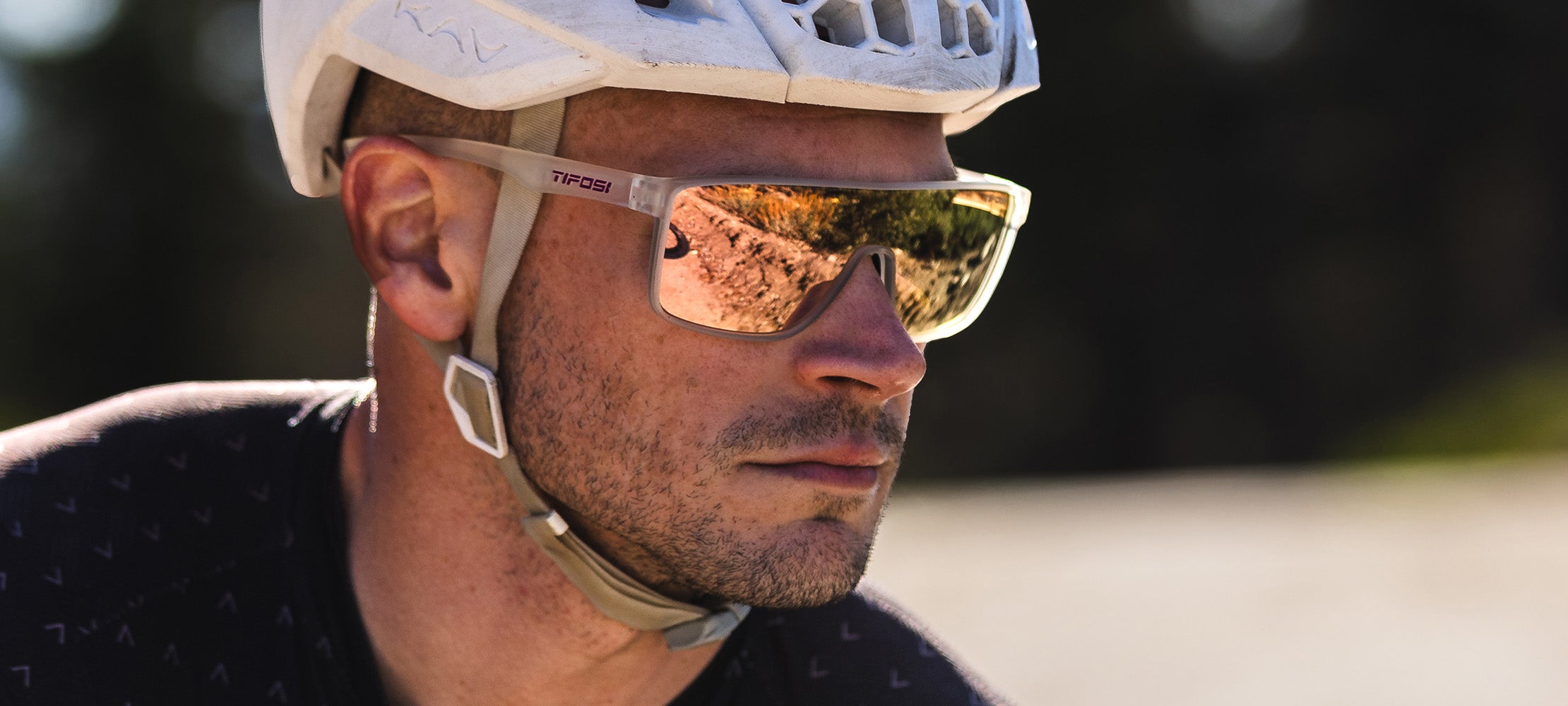 Male cyclist wearing Sanctum pink satin clear