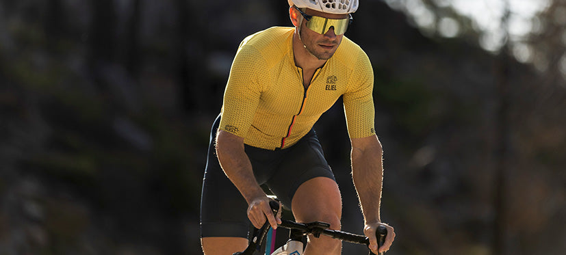 Male cyclist wearing shield sunglasses