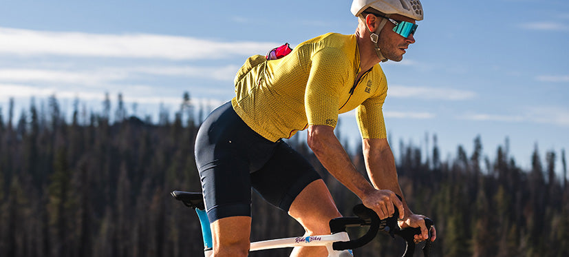 Man riding bike standing up