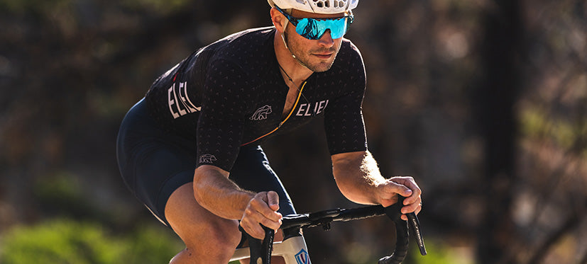 Male cyclist wearing blue shield sunglasses