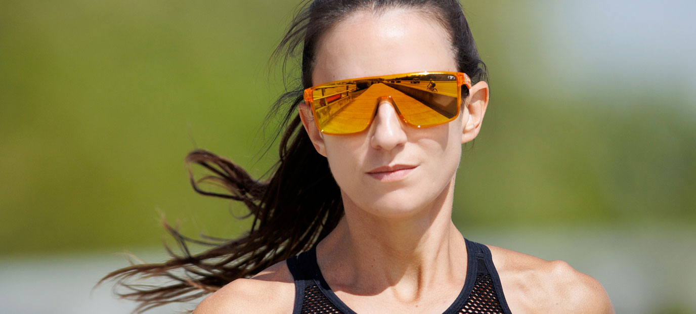 Woman wearing Sanctum amber blaze sunglasses