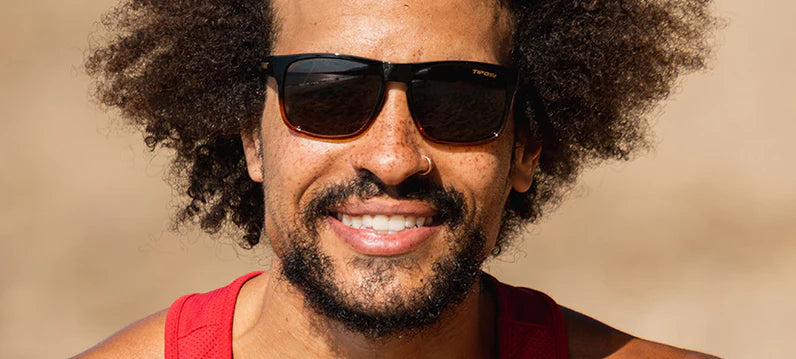 Man smiling wearing Swick sunglasses