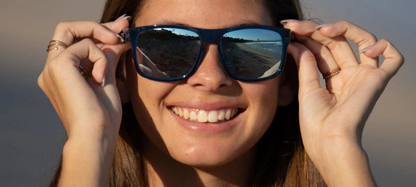 Woman smiling wearing Swick sunglasses