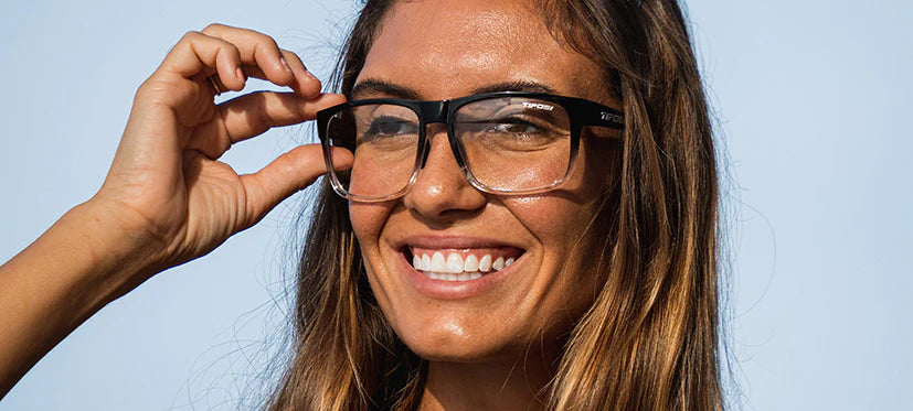 Woman wearing Swick clear lens frames