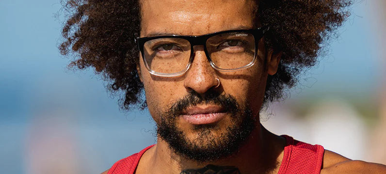 Man wearing Swick clear lens frames
