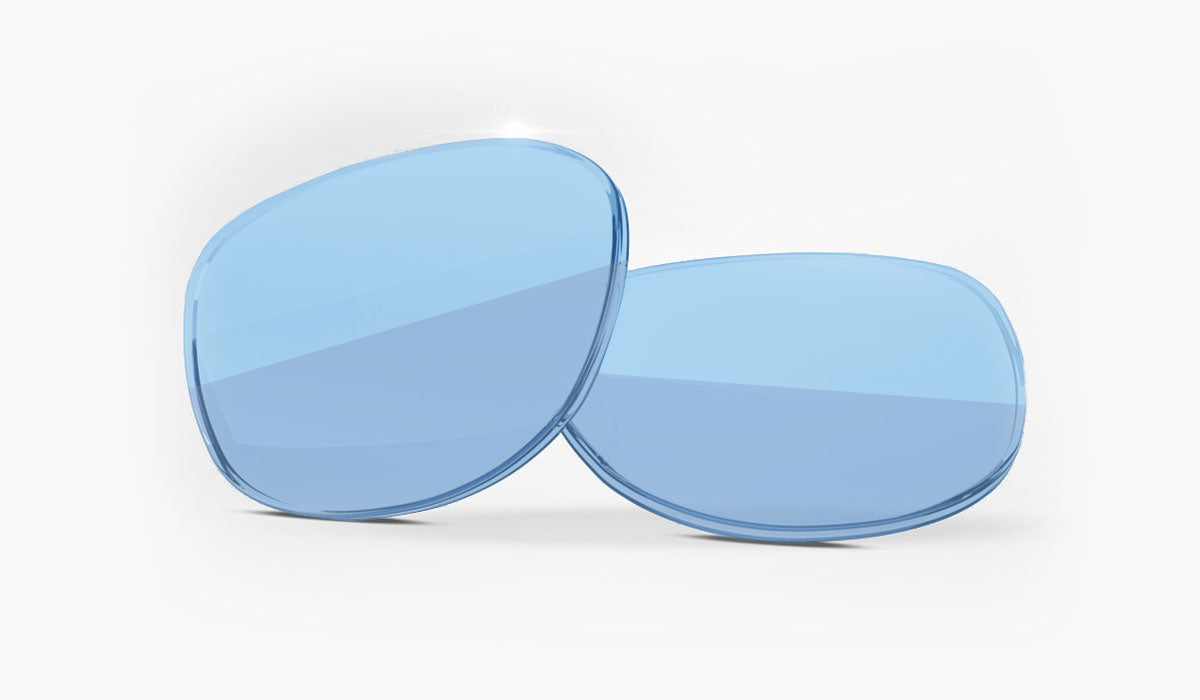 Two blue lens inserts on a white background