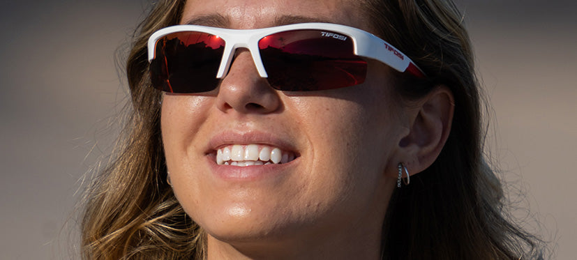 Female wearing Shutout sport sunglass in white/red