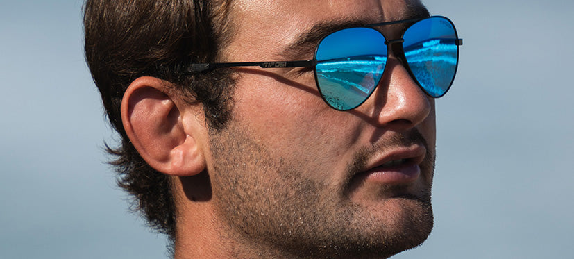 male wearing Shwae aviator tangle free sport sunglass in graphite
