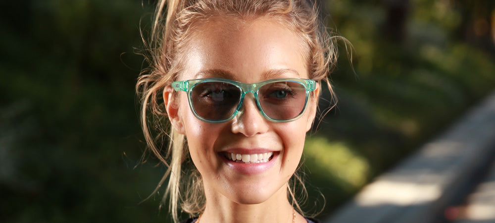 Female wearing Swank aqua shimmer sunglasses