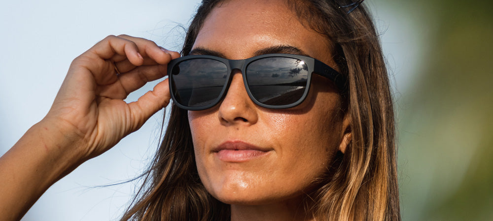 Female wearing Swank blackout sunglasses
