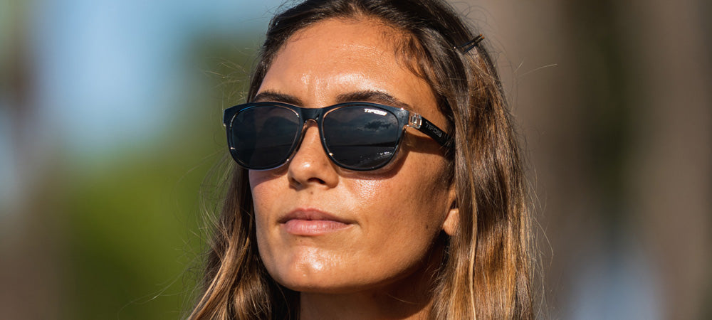 Female wearing Swank onyx fade sunglasses