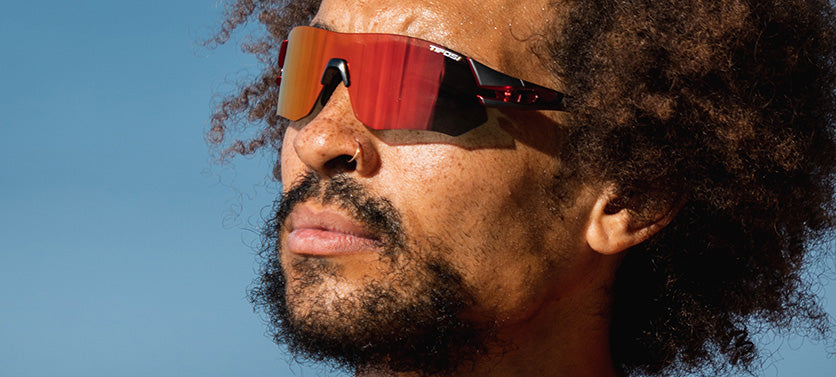 Male wearing Tsali Gunmetal Red with Clarion Red lens sunglasses