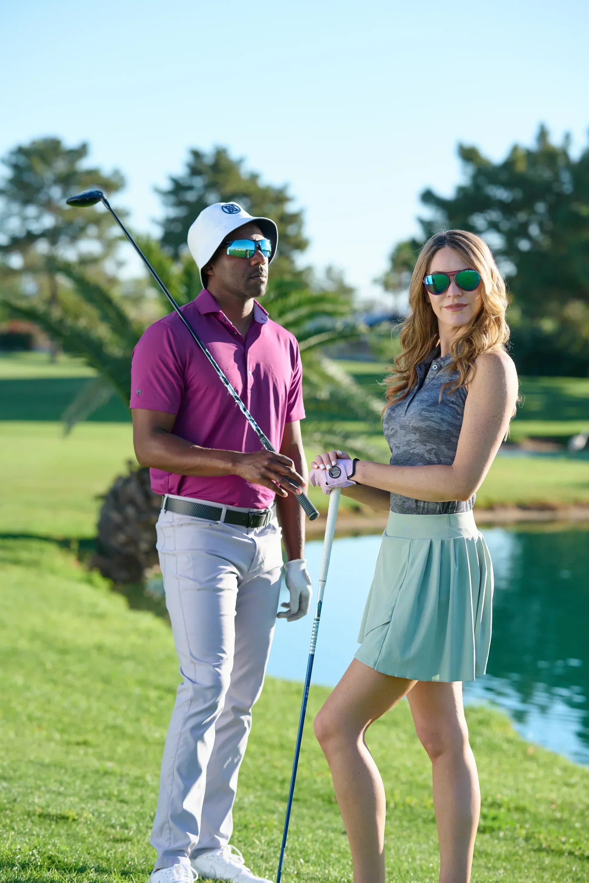Two golfers wearing Tifosi golf sunglasses