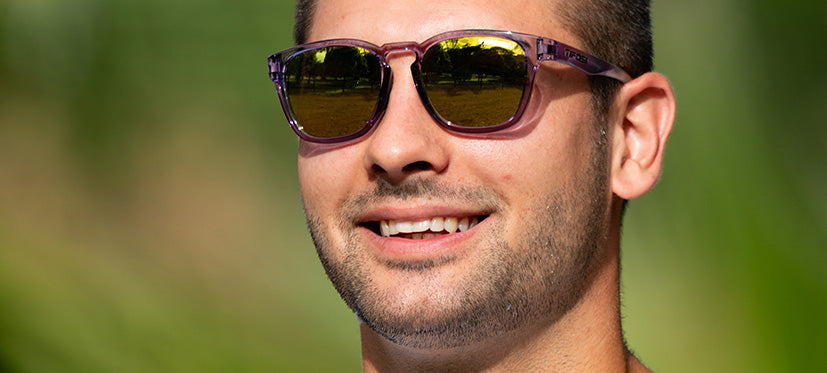 Male with Smirk Just B Violet sunglass