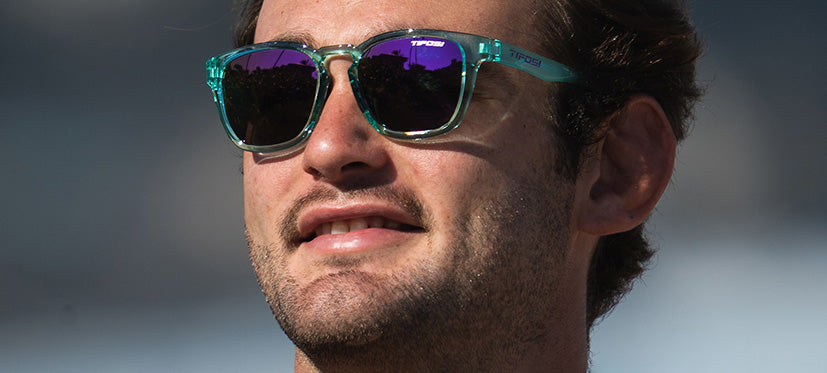 male wearing Smirk sport sunglass in aqua shimmer