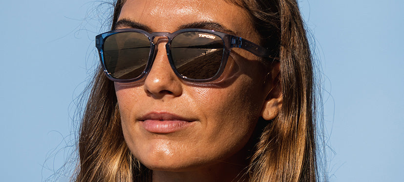 female wearing Smirk sport sunglass in crystal denim