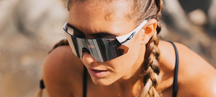 female runner rail white black shield sunglass