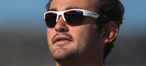 Male wearing Strikeout sport sunglasses in matte white