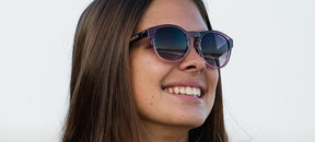 female wearing Svago crystal peach blush lifestyle sport sunglasses