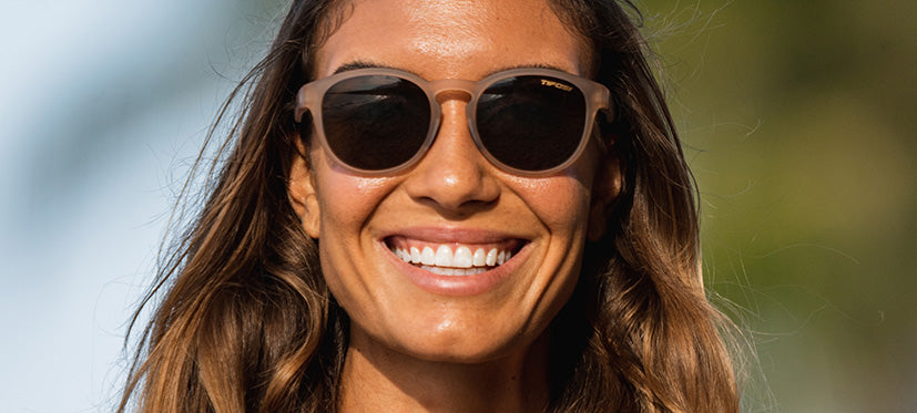 Female wearing Svago satin crystal brown lifestyle sport sunglasses