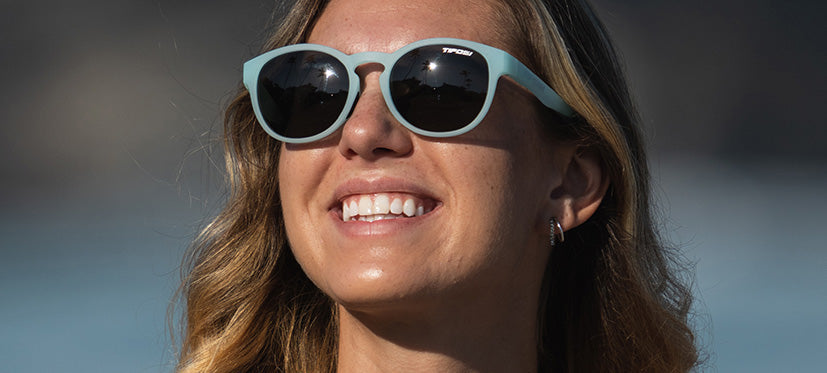 Female wearing Svago satin crystal teal lifestyle sport sunglasses