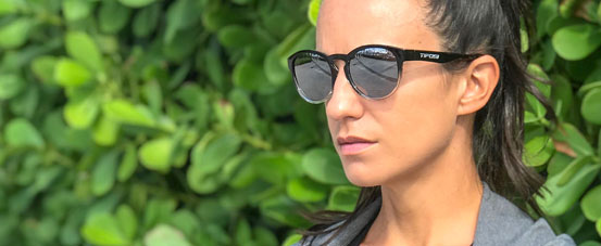 female wearing Svago lifestyle sport sunglasses in onyx fade