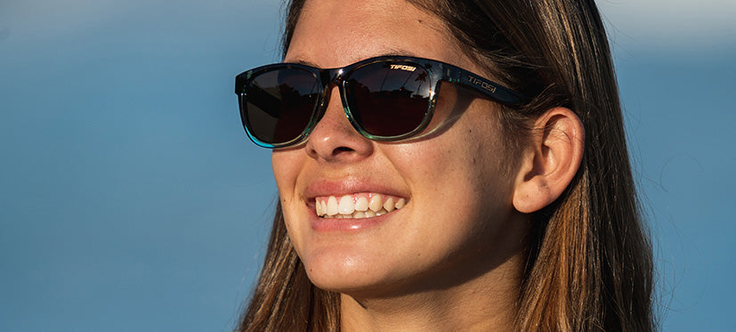 Female wearing Swank blue confetti sunglasses