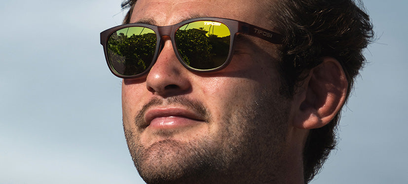 Male wearing Swank woodgrain sunglasses