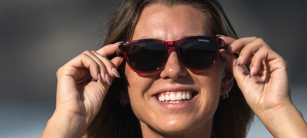 Female wearing Swank pink confetti sunglasses