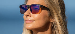 Female wearing Swank SL satin vapor sunglasses