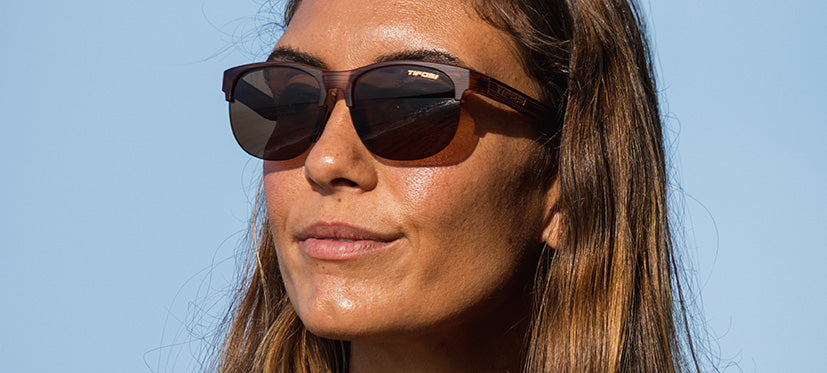 Female wearing Swank SL woodgrain sunglasses