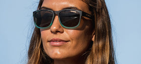 Female wearing Swank XL Matte Blue Tortoise sunglasses