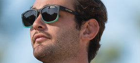 Male wearing Swank XL Matte Blue Tortoise sunglasses