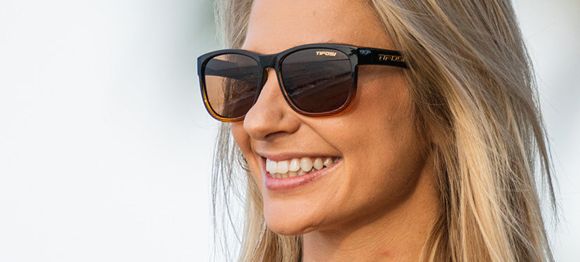 Female wearing Swank XL brown fade polarized sunglasses