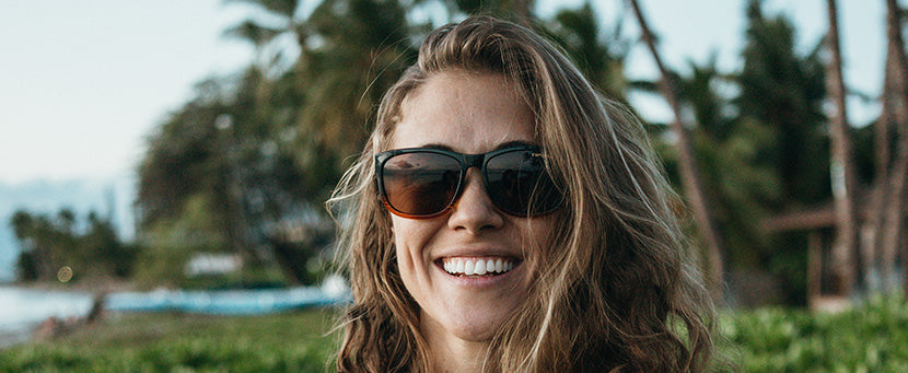 Female wearing Swank XL brown fade sunglasses