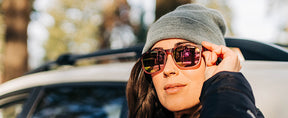 Female wearing Swank XL matte pink tortoise sunglasses