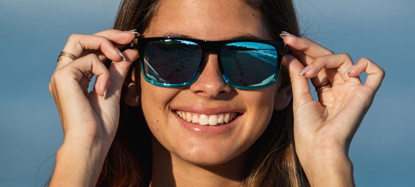 Female wearing onyx blue fade sunglasses