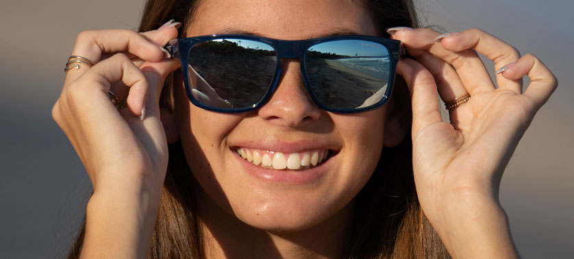 Female wearing Swick midnight navy sunglasses