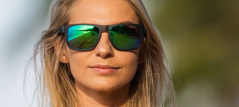 Female wearing Swick Satin Vapor smoke green sunglasses