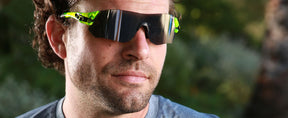 Male wearing Tsali Neon Green sunglass with Smoke lens